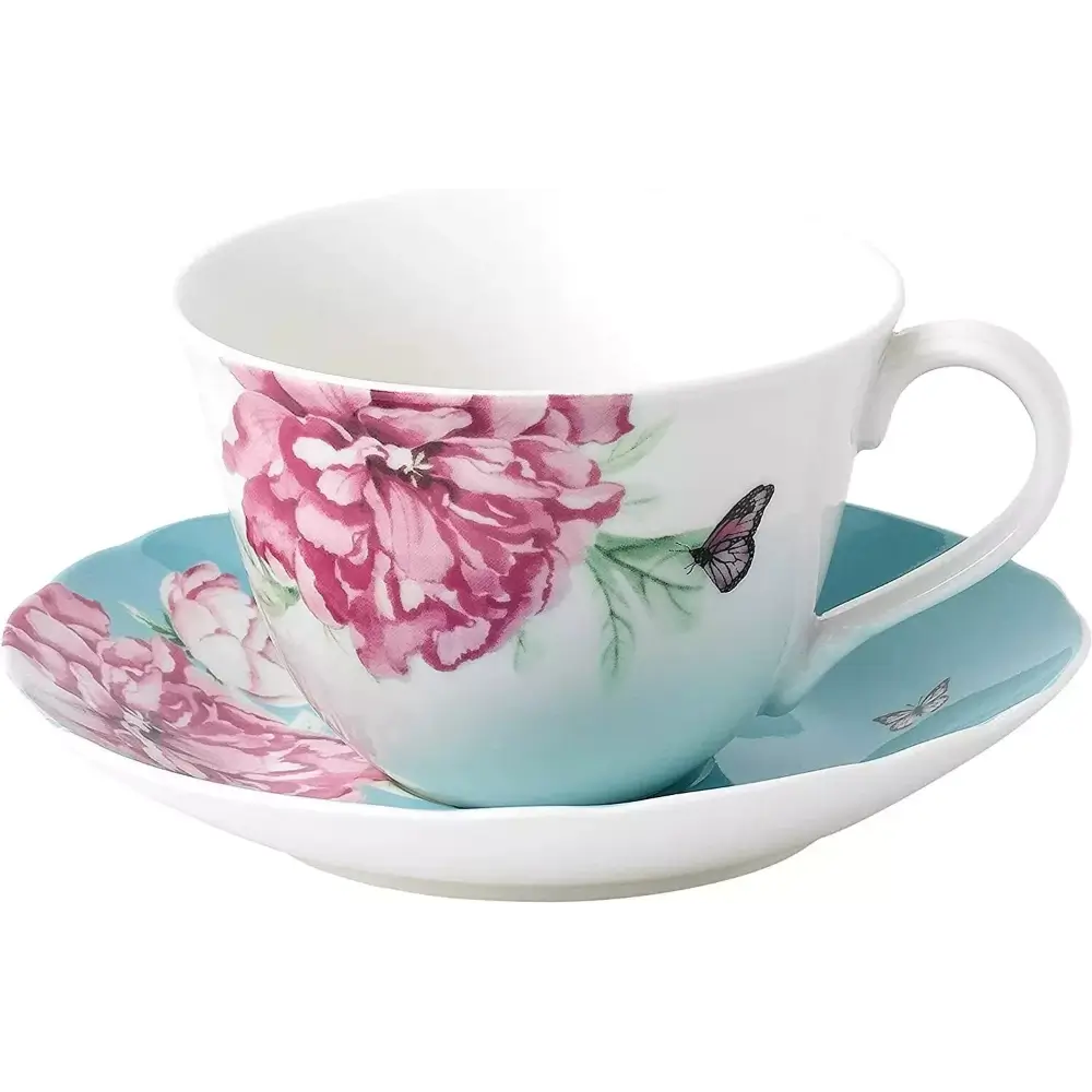 Ceramic cup and saucer with floral design