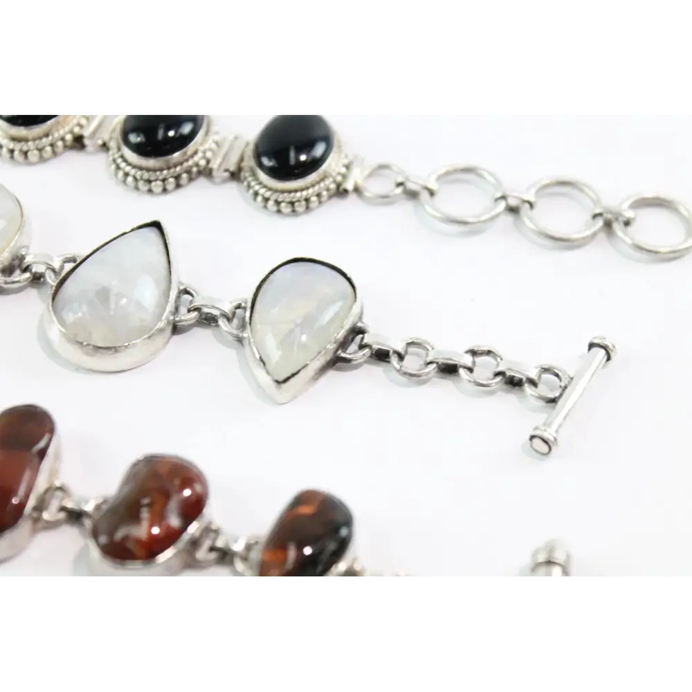 Bracelet with heart-shaped gemstones on a white background