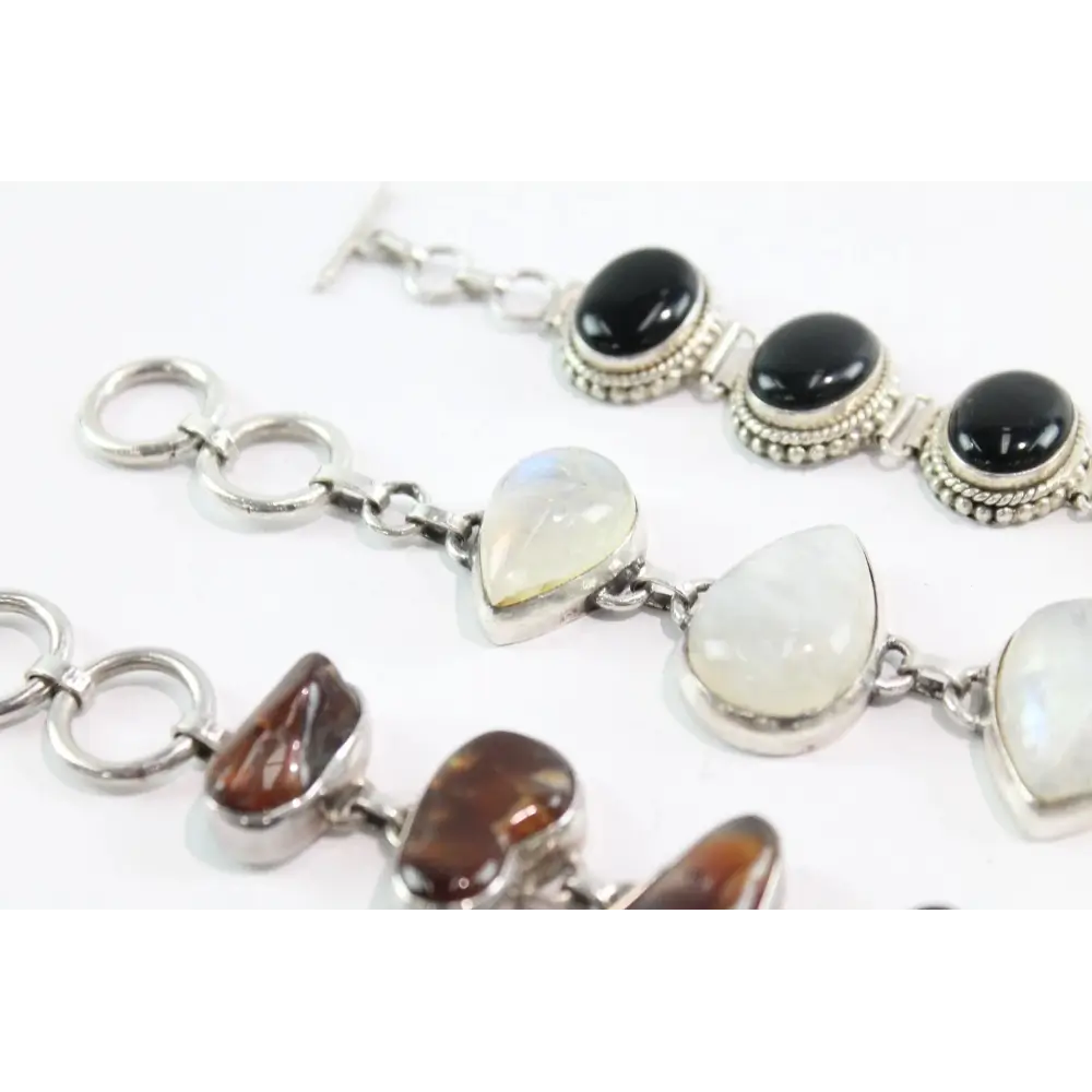 Bracelet with heart-shaped gemstones on a white background