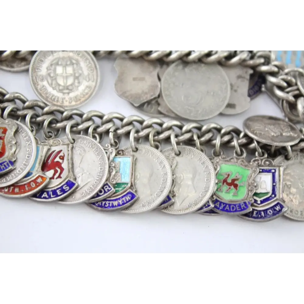 Silver chain with various coins