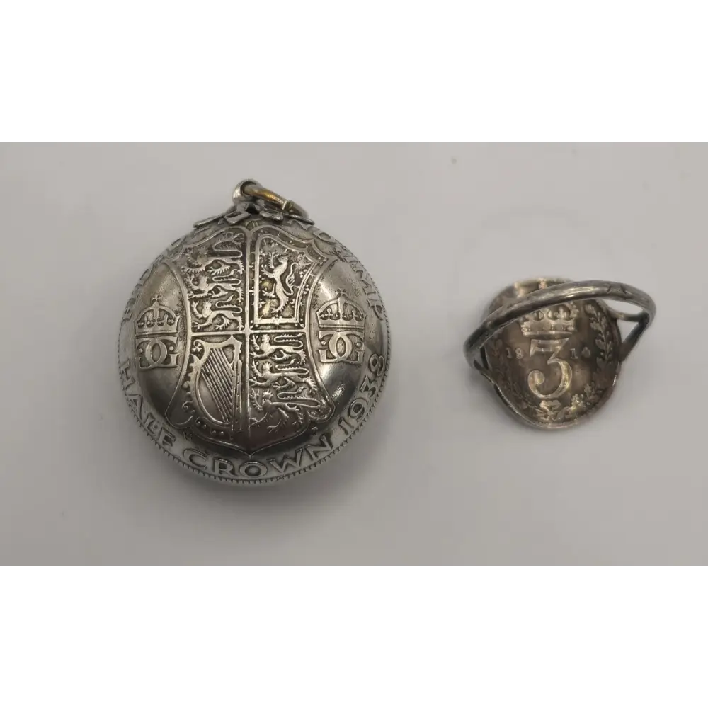 Silver medallion and ring with engraved designs