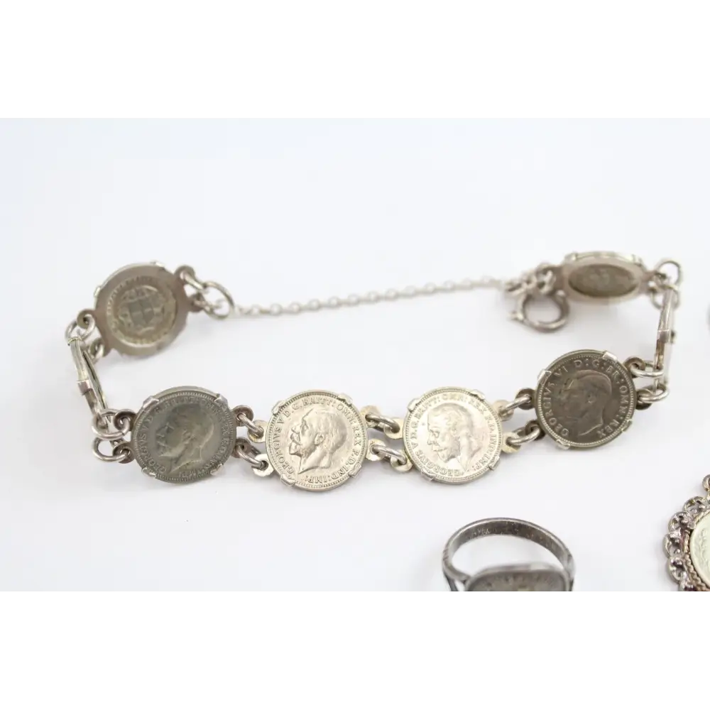 Bracelet made of coin links on a white background
