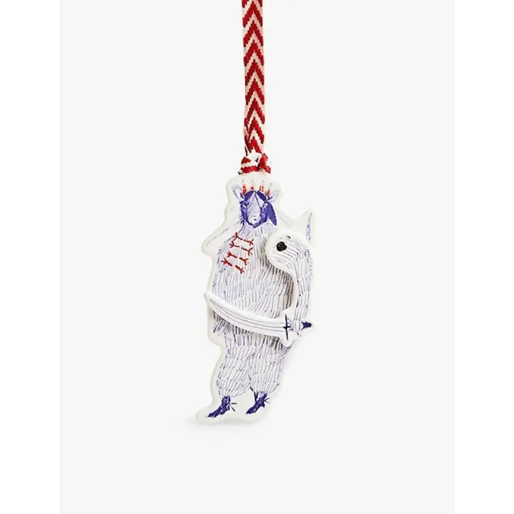 Decorative ornament with a white creature design