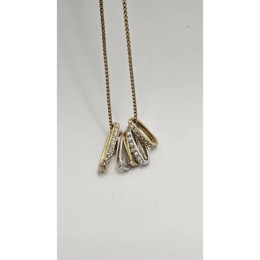 Swarovski Gold Tone Multi-Ring Pendant Necklace with Rhinestones