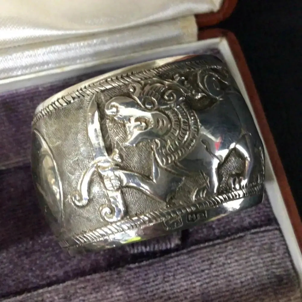 Silver ring with intricate design