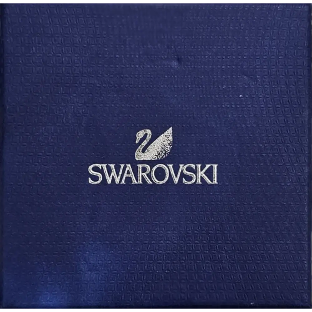 Swarovski logo on a textured blue background