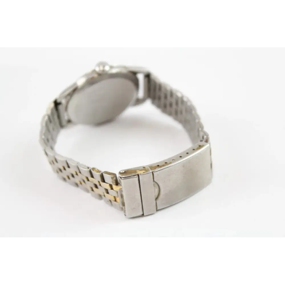 Metallic watch band on a white background