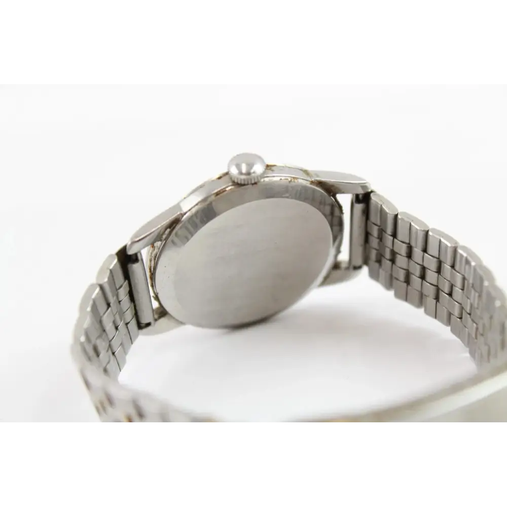 Silver watch with a white face