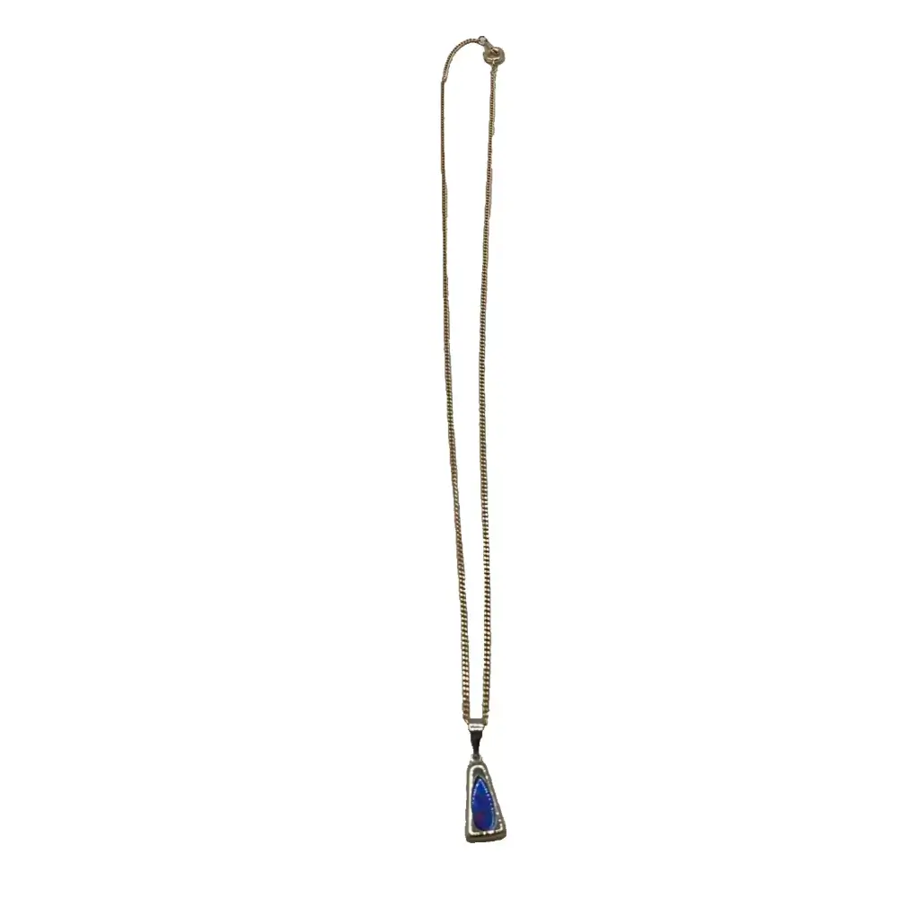 Necklace with a blue pendant on a white background