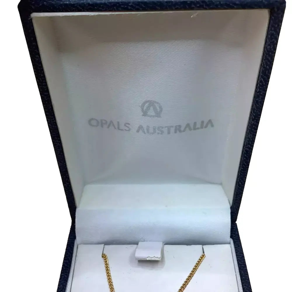 Open jewelry box with 'Opals Australia' branding, containing a gold necklace