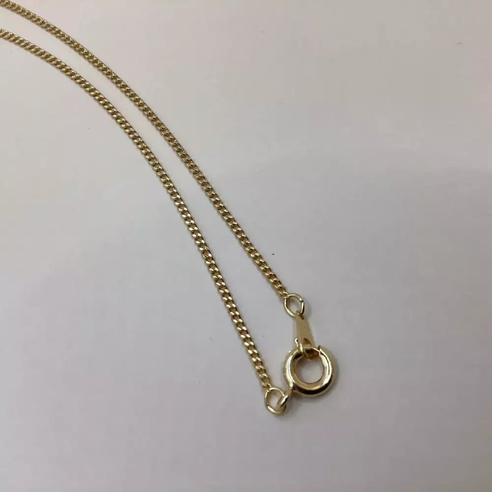 Gold chain necklace with a clasp