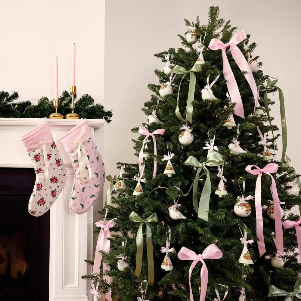 Decorated Christmas tree with pink and green ribbons and ornaments