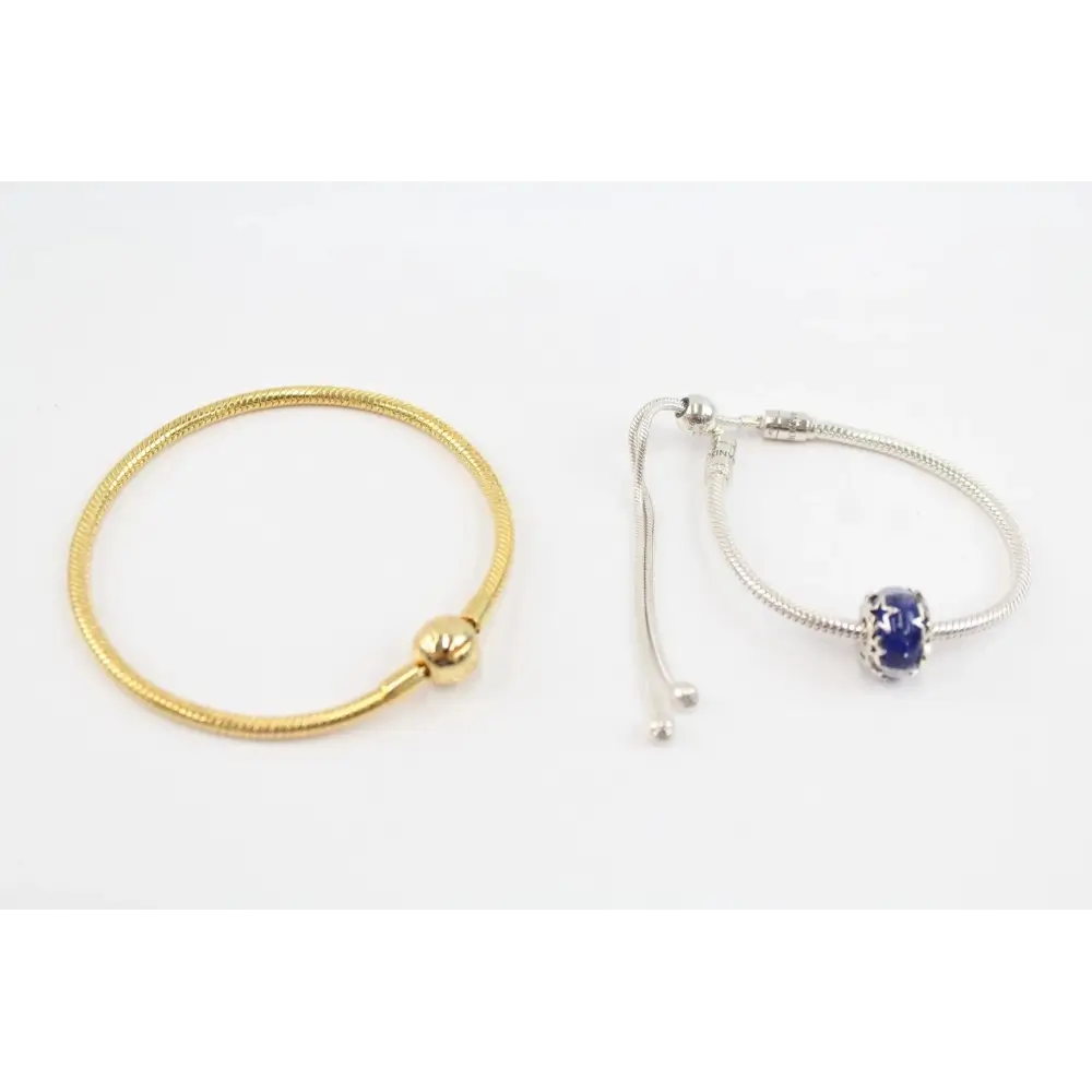 Gold and silver bracelets with blue stones