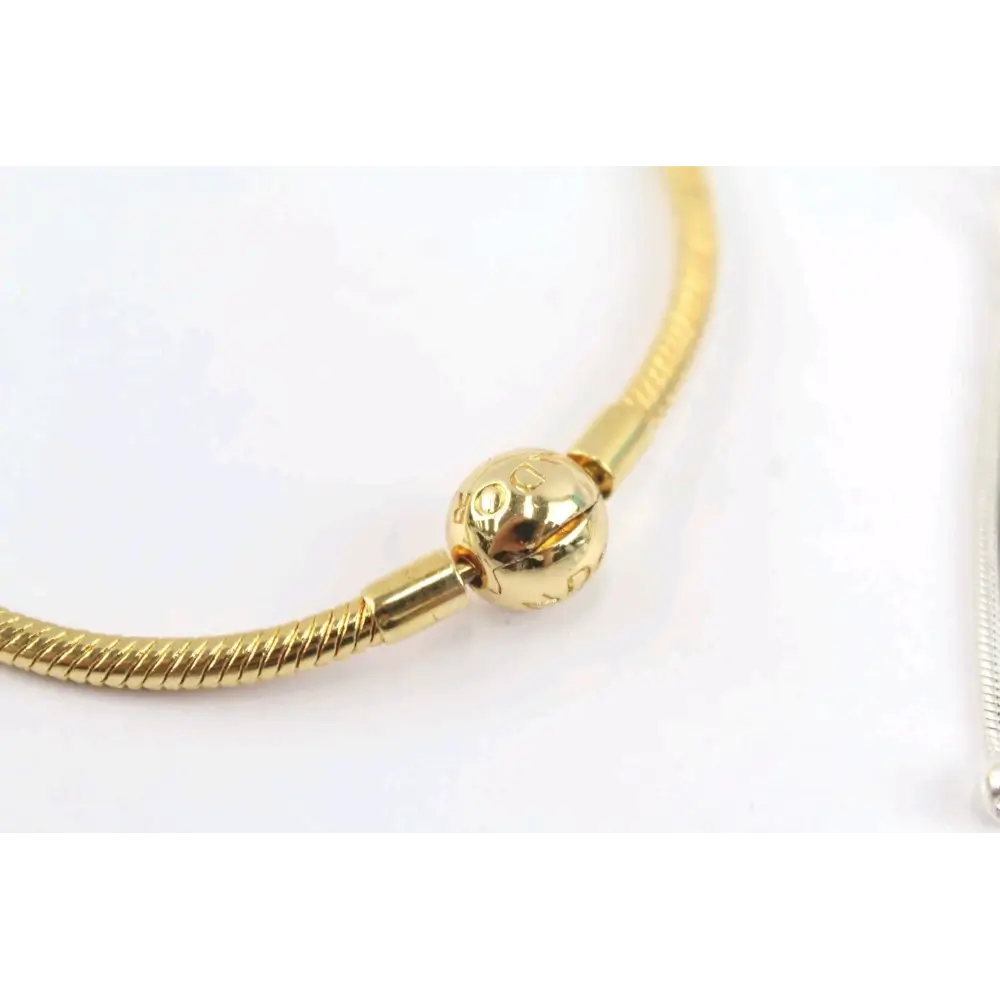 Gold bracelet on a white background