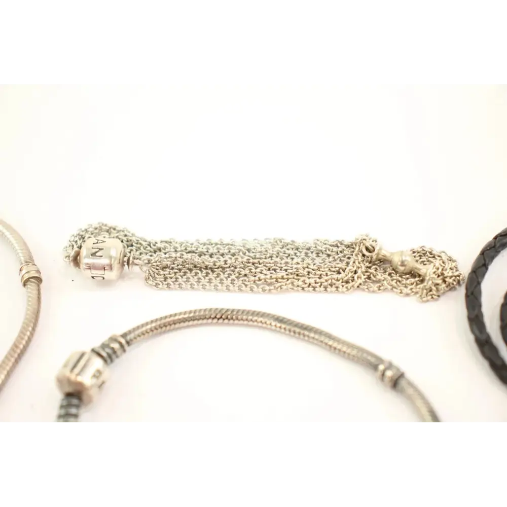 Collection of gold and silver bracelets