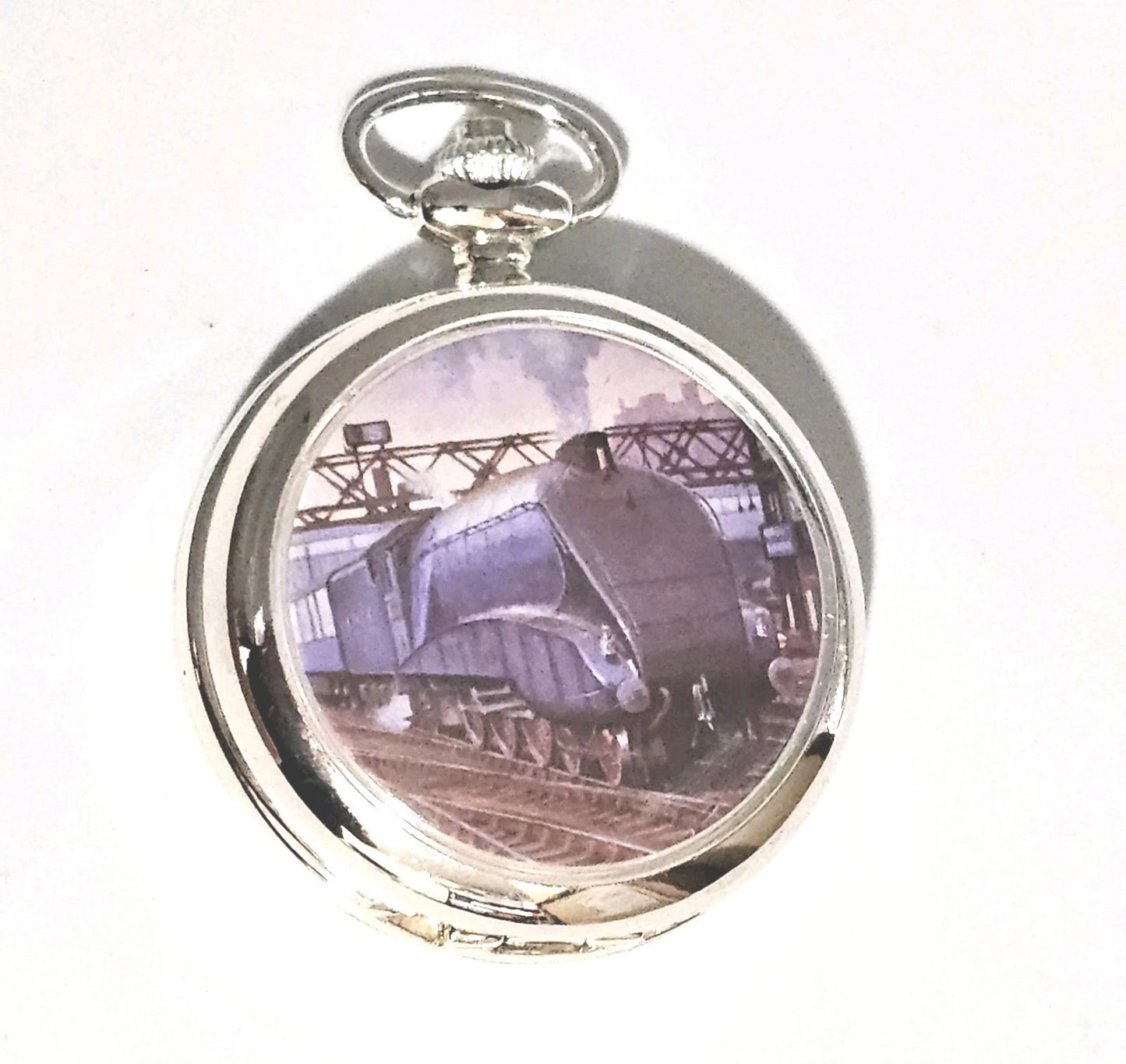 Silver pocket watch with a train image on the glass cover