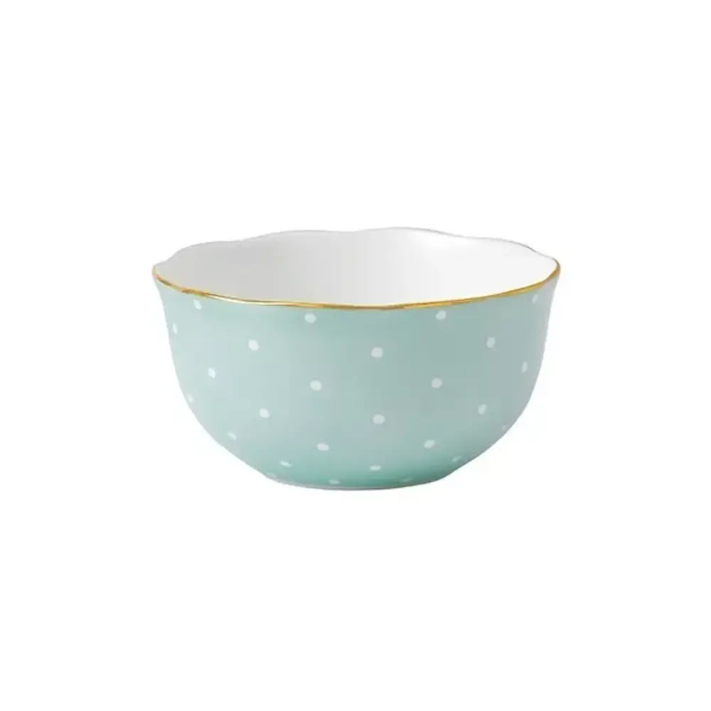 Light blue ceramic bowl with white polka dots