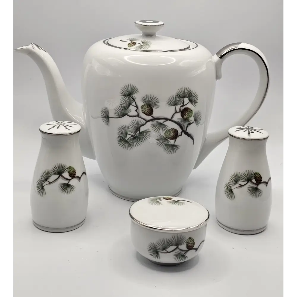 Ohno Kutani hand-painted Japanese porcelain set arranged for display
