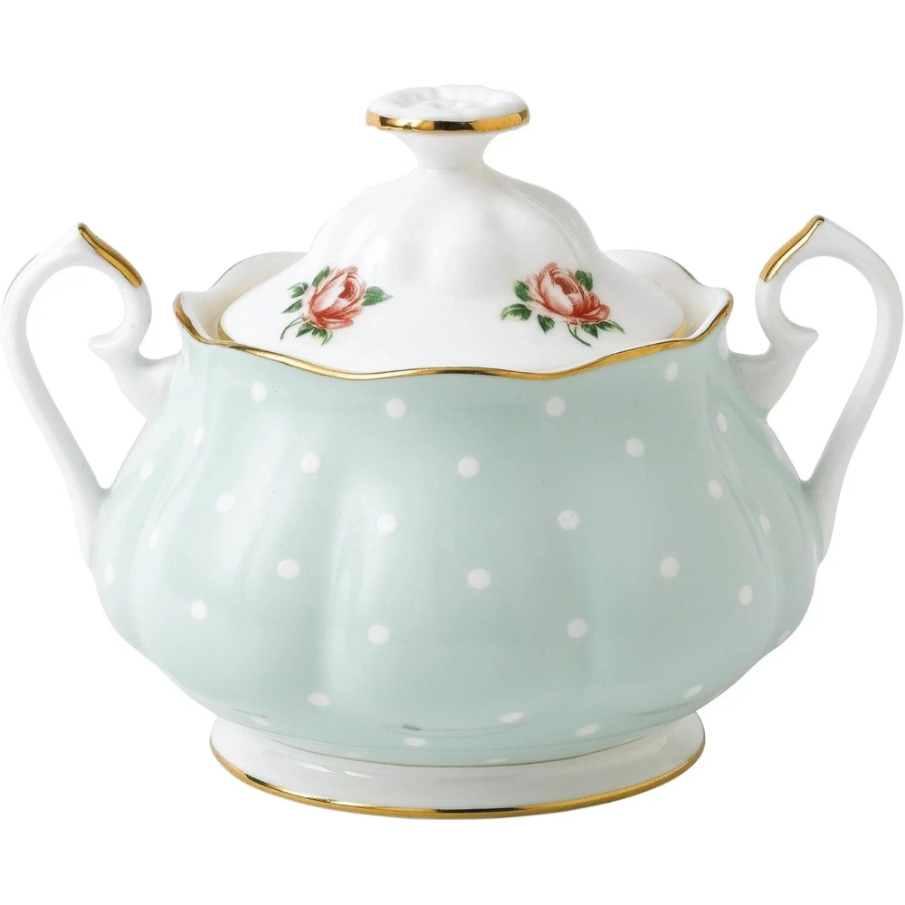 Porcelain sugar bowl with floral design and polka dots