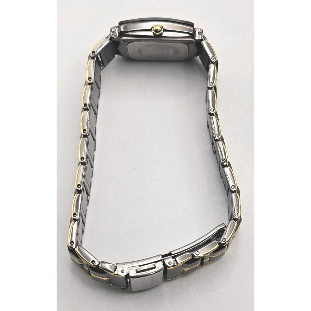 Silver watch band on a white background