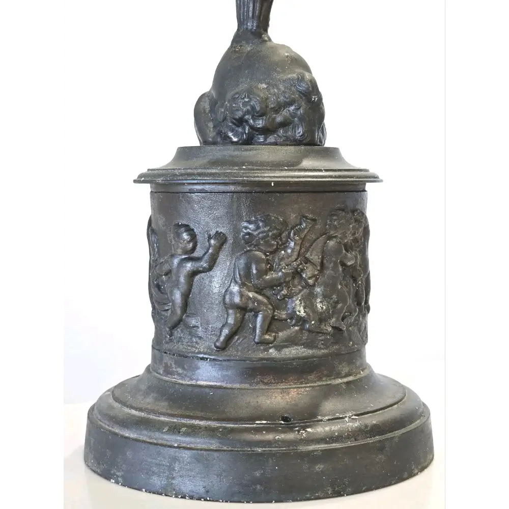 Decorative black urn with relief sculptures