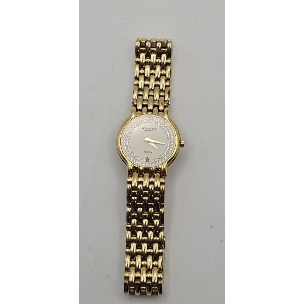 Gold watch with a chain-like band
