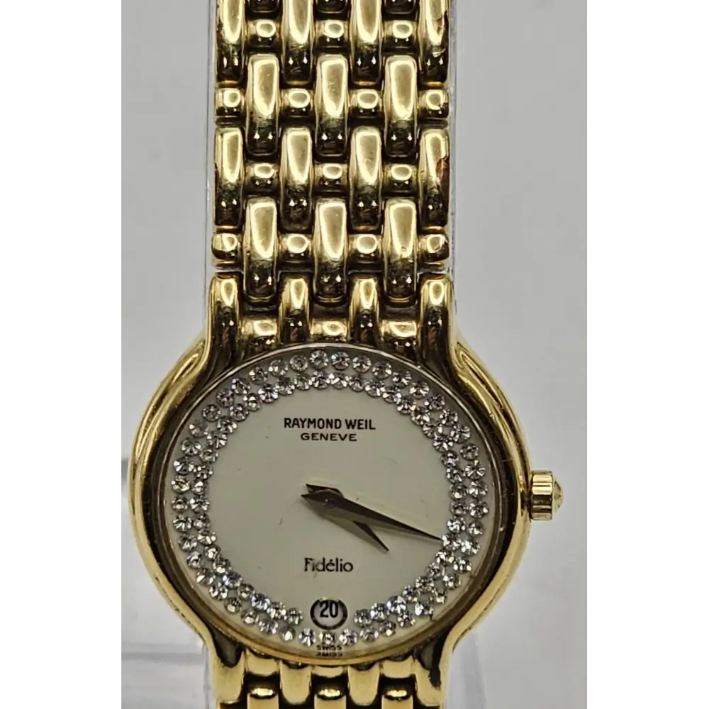 Gold wristwatch with diamond-studded
