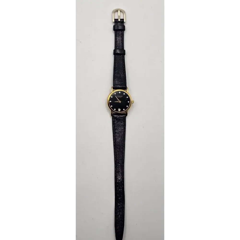 Wristwatch with black strap and gold case