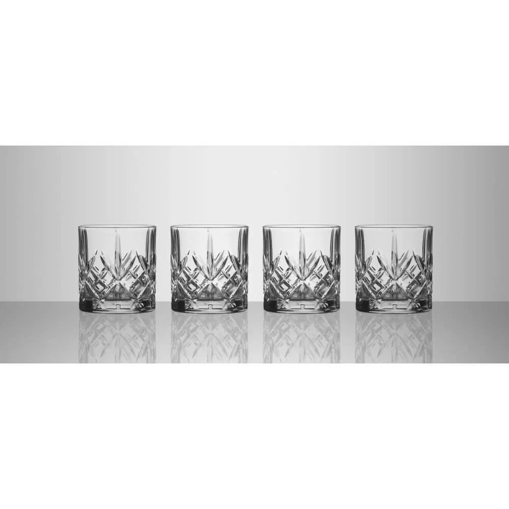 Four crystal glasses with geometric patterns