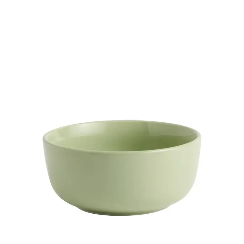 Green ceramic bowl on a white background