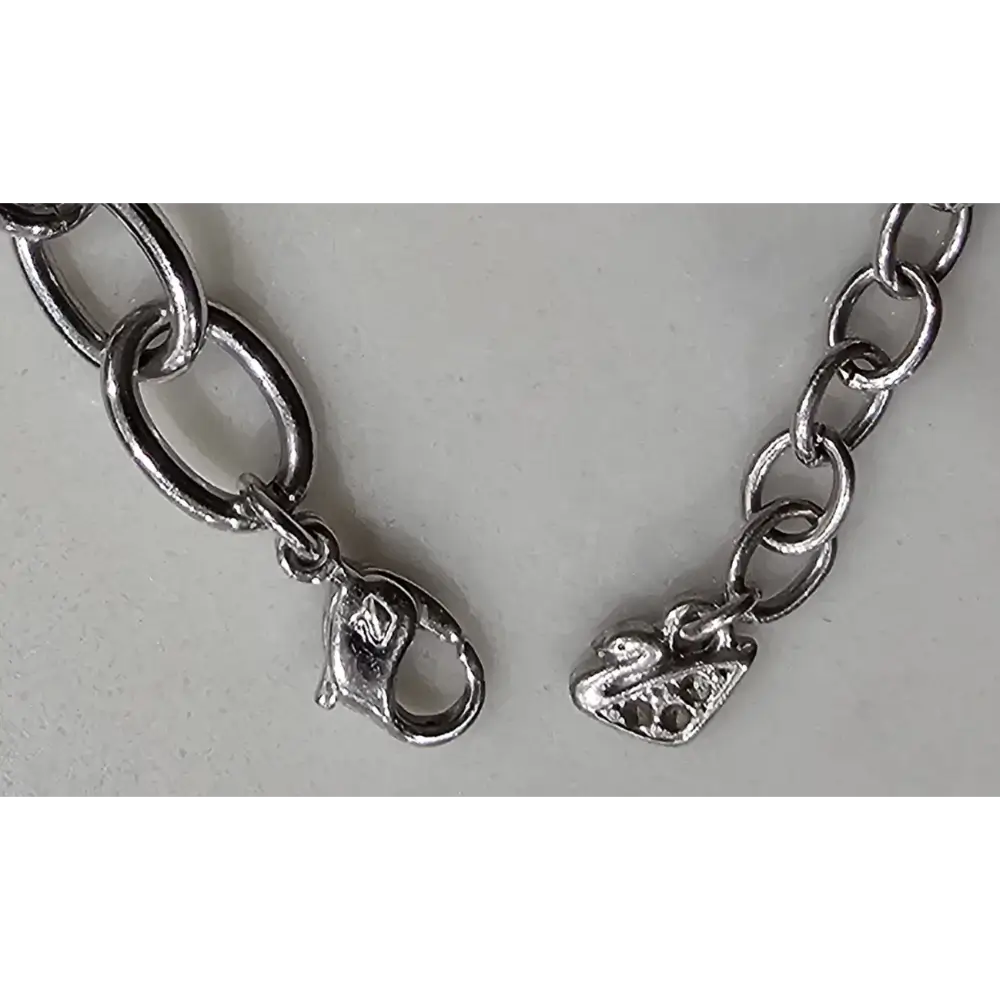 Silver chain bracelet with heart-shaped charms