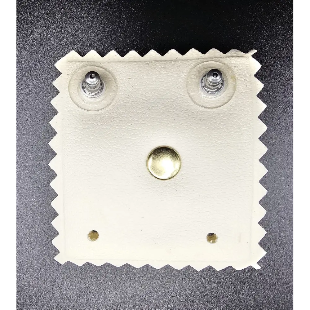 White leather patch with metal studs