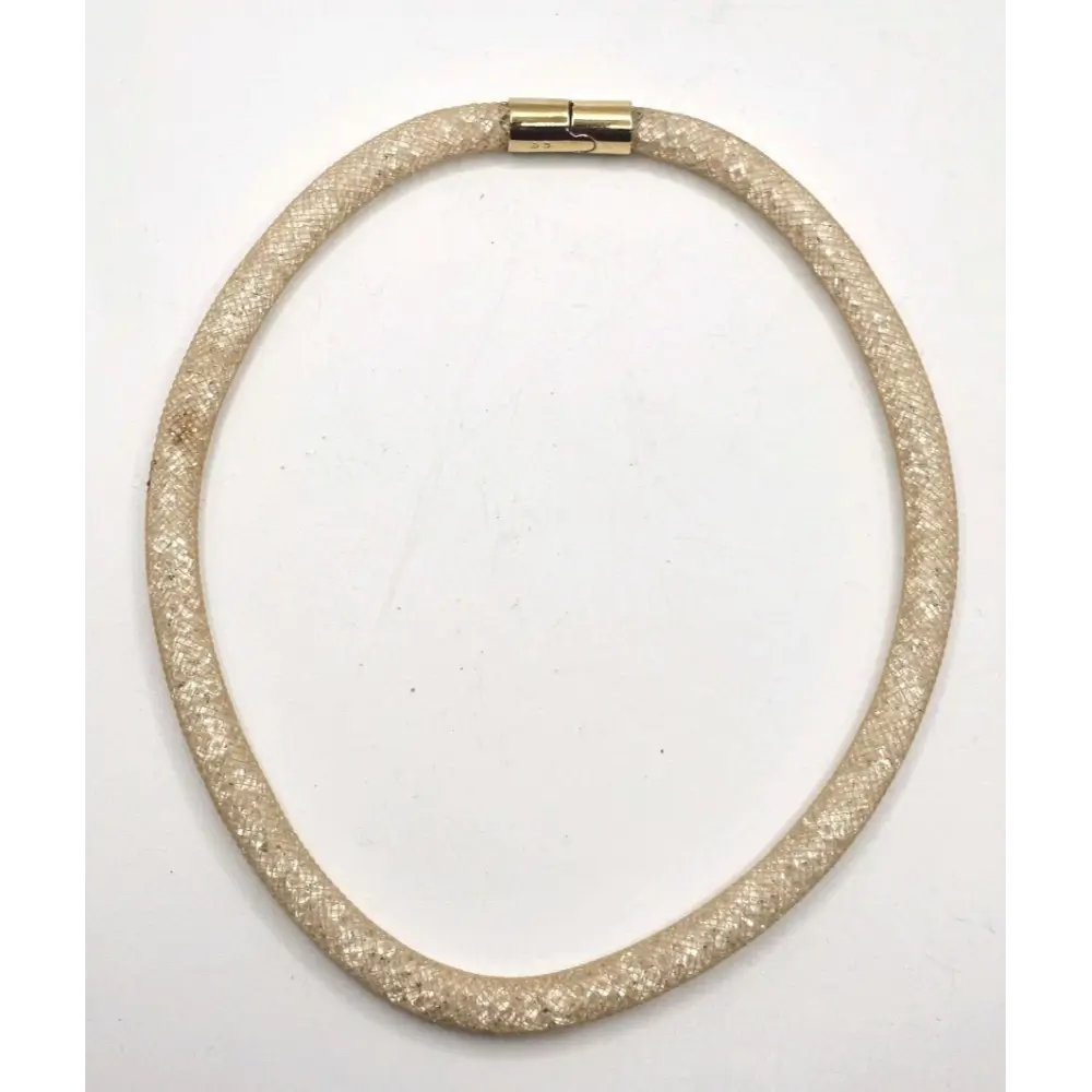 Gold necklace with a textured finish