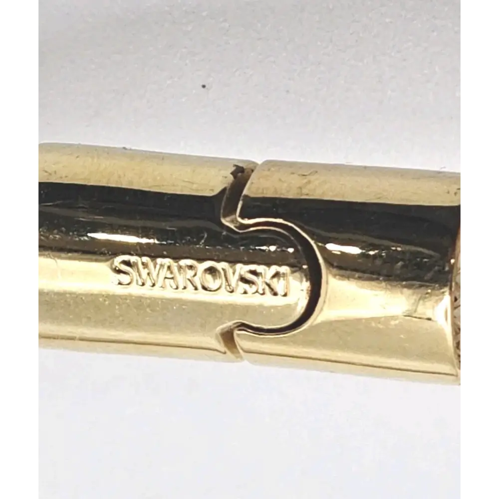 Gold Clasp with Swarovski logo
