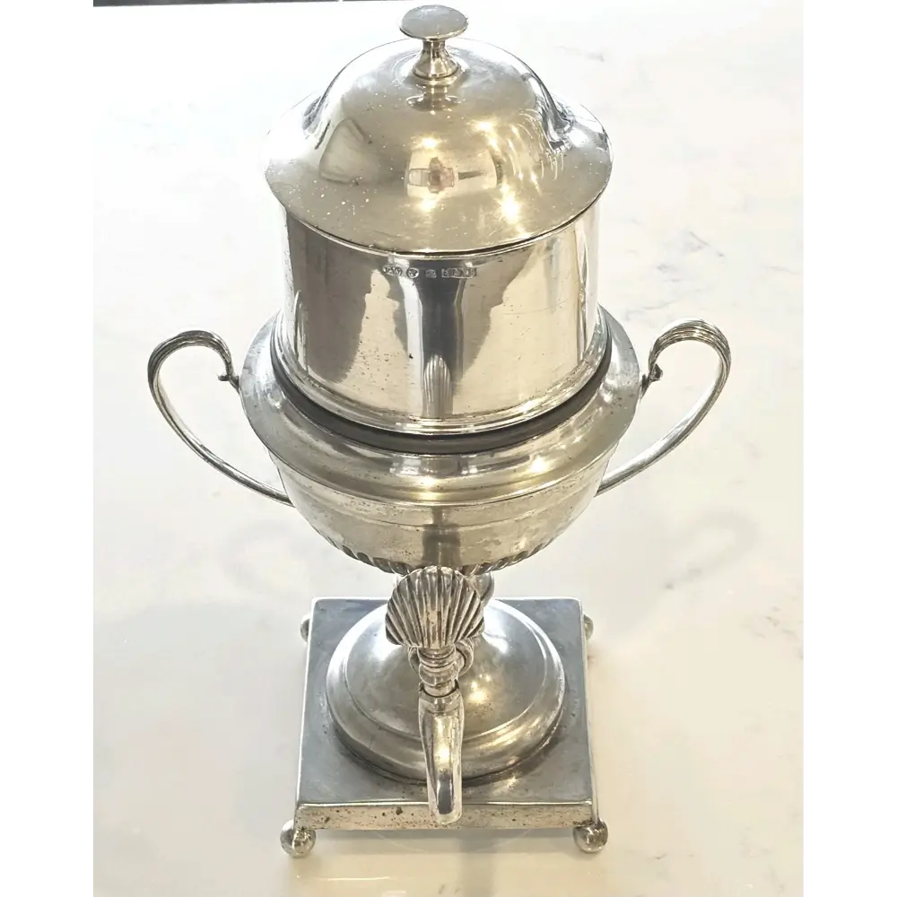 Vintage silver plated tea urn from T.W. & Sons, collectible centerpiece with a lid