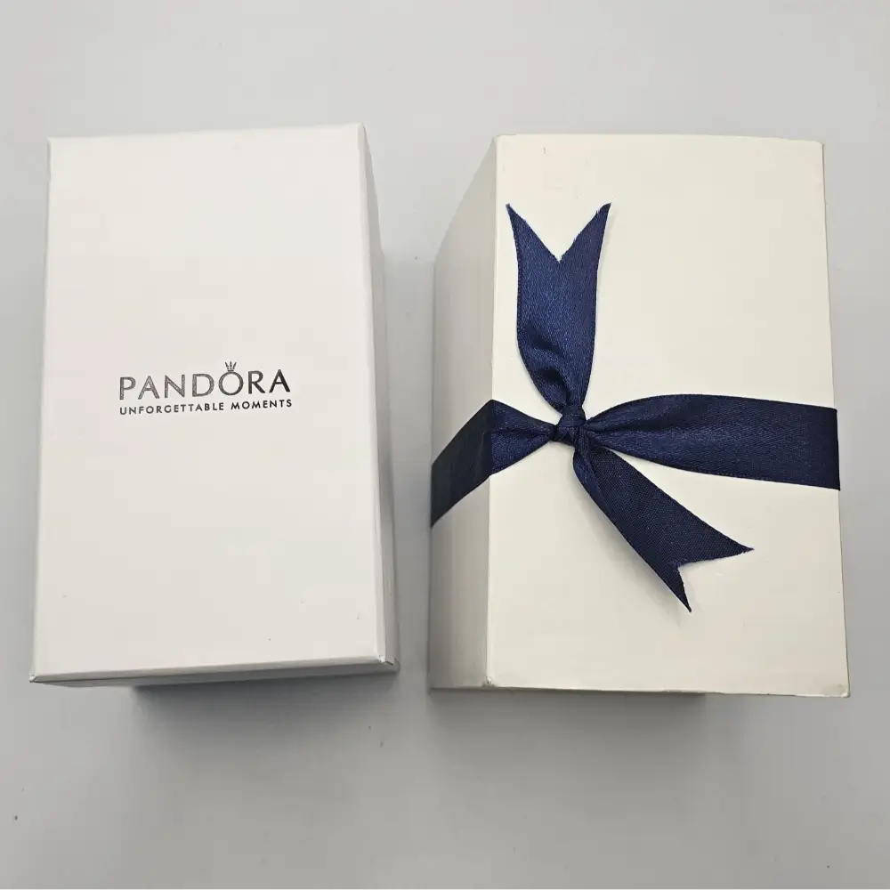 Pandora gift box with a navy blue ribbon