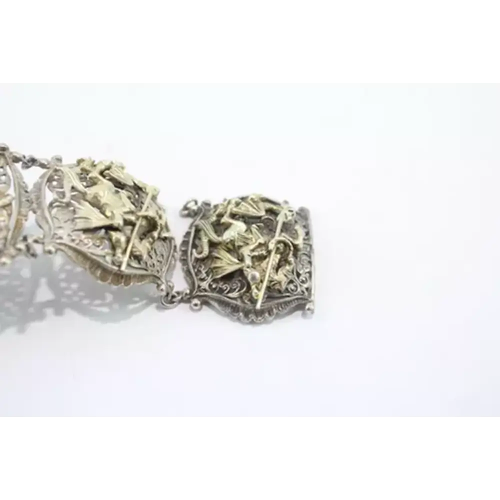 Silver bracelet with intricate designs