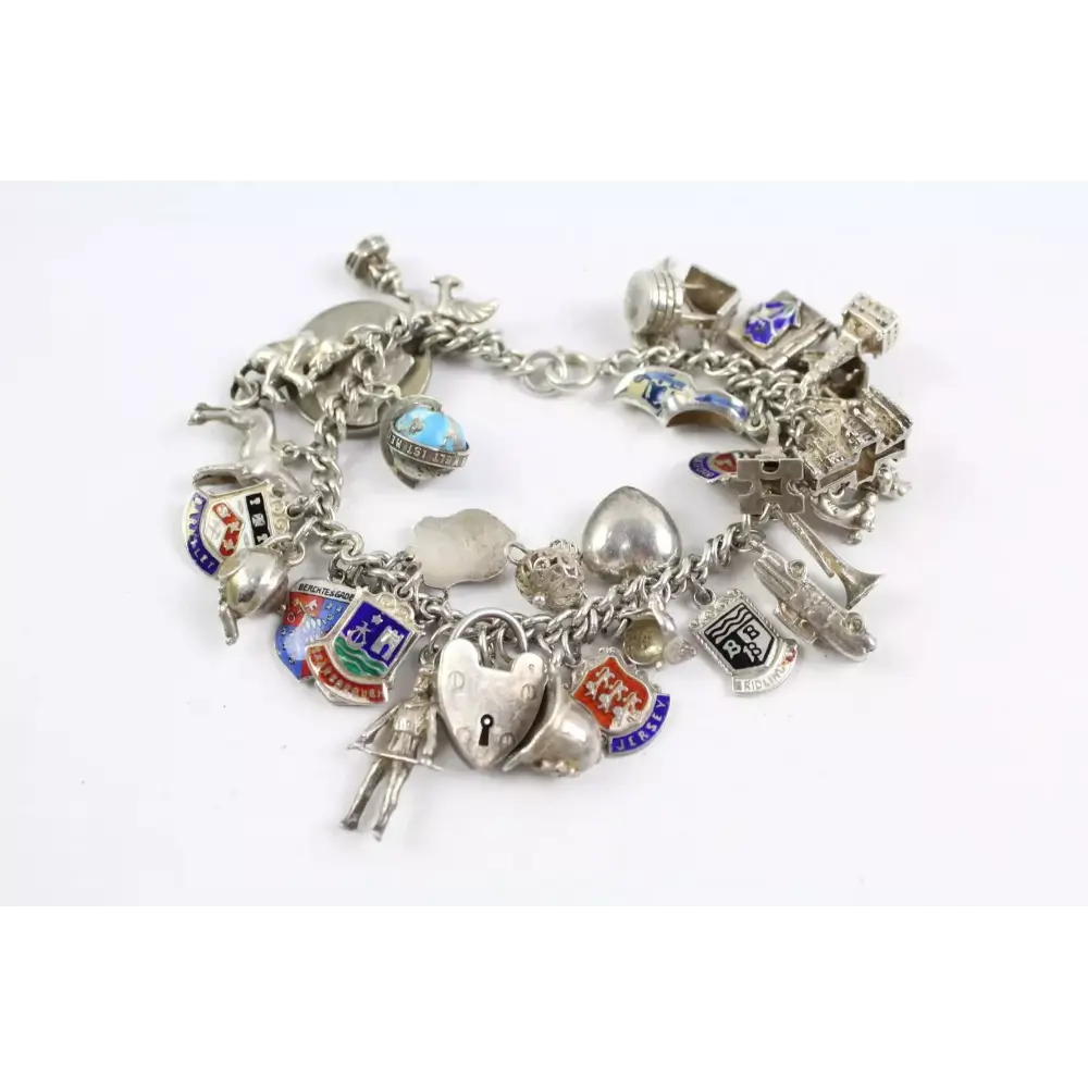 Silver charm bracelet with various charms