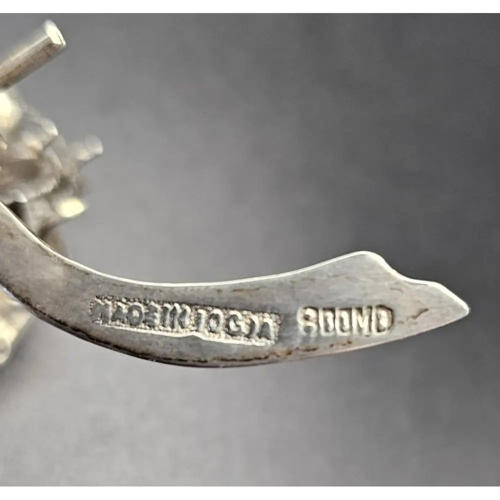 Metallic object with engraved text