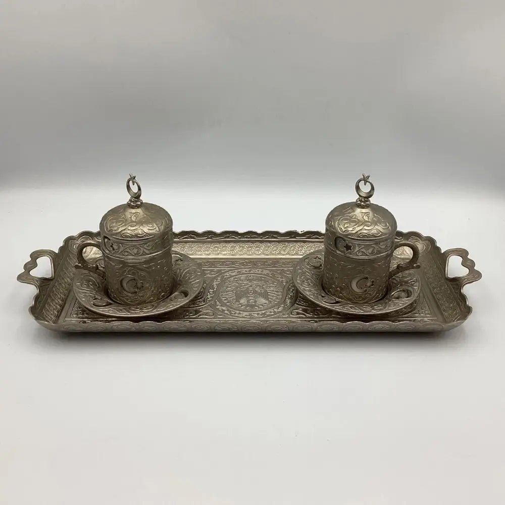 Silver inkwell set with two inkwells and a tray