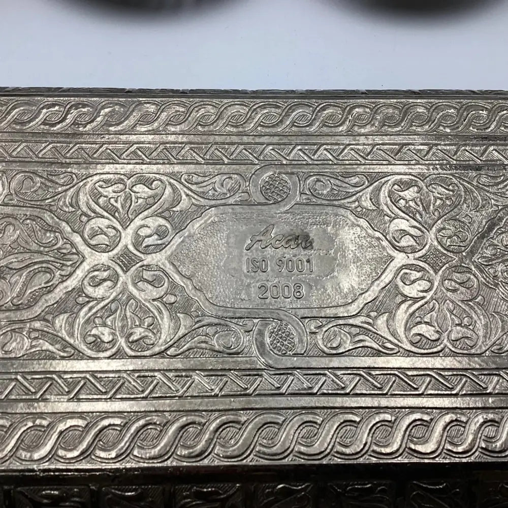 Decorative metal box with intricate patterns