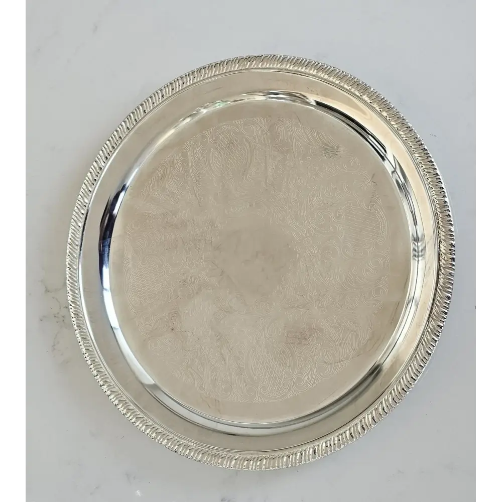 Silver platter with intricate design