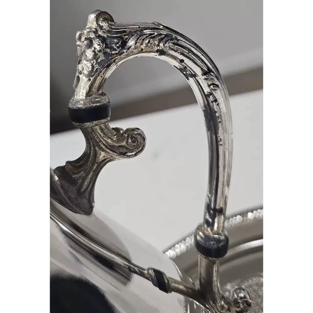 Close-up of a silver cymbal with decorative finial