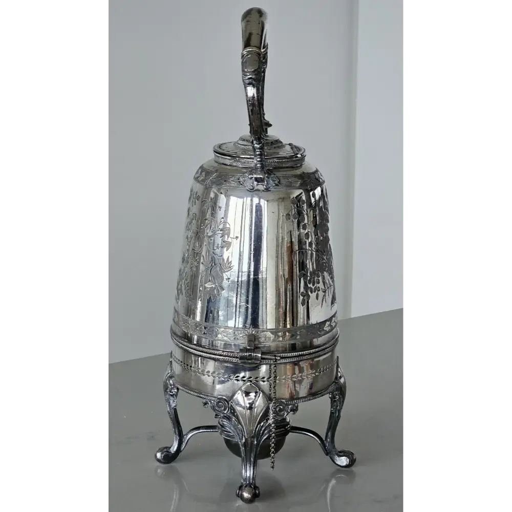 Silver decorative object with a handle