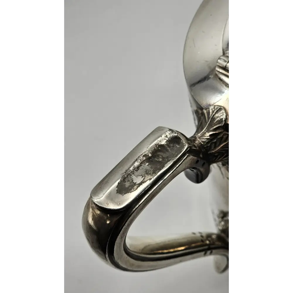 Close-up of a silver ring with intricate design