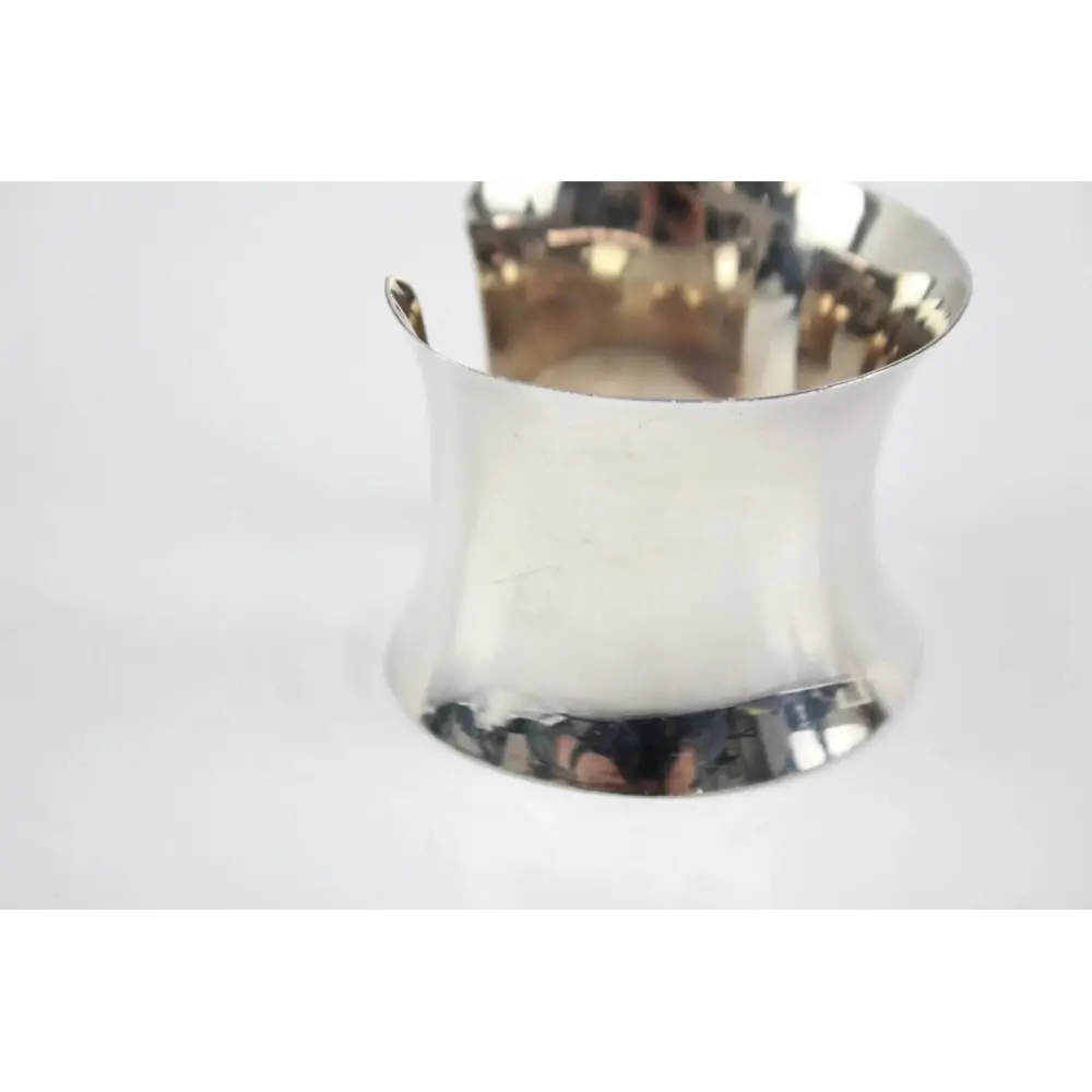 Silver metal Bangle on a white background