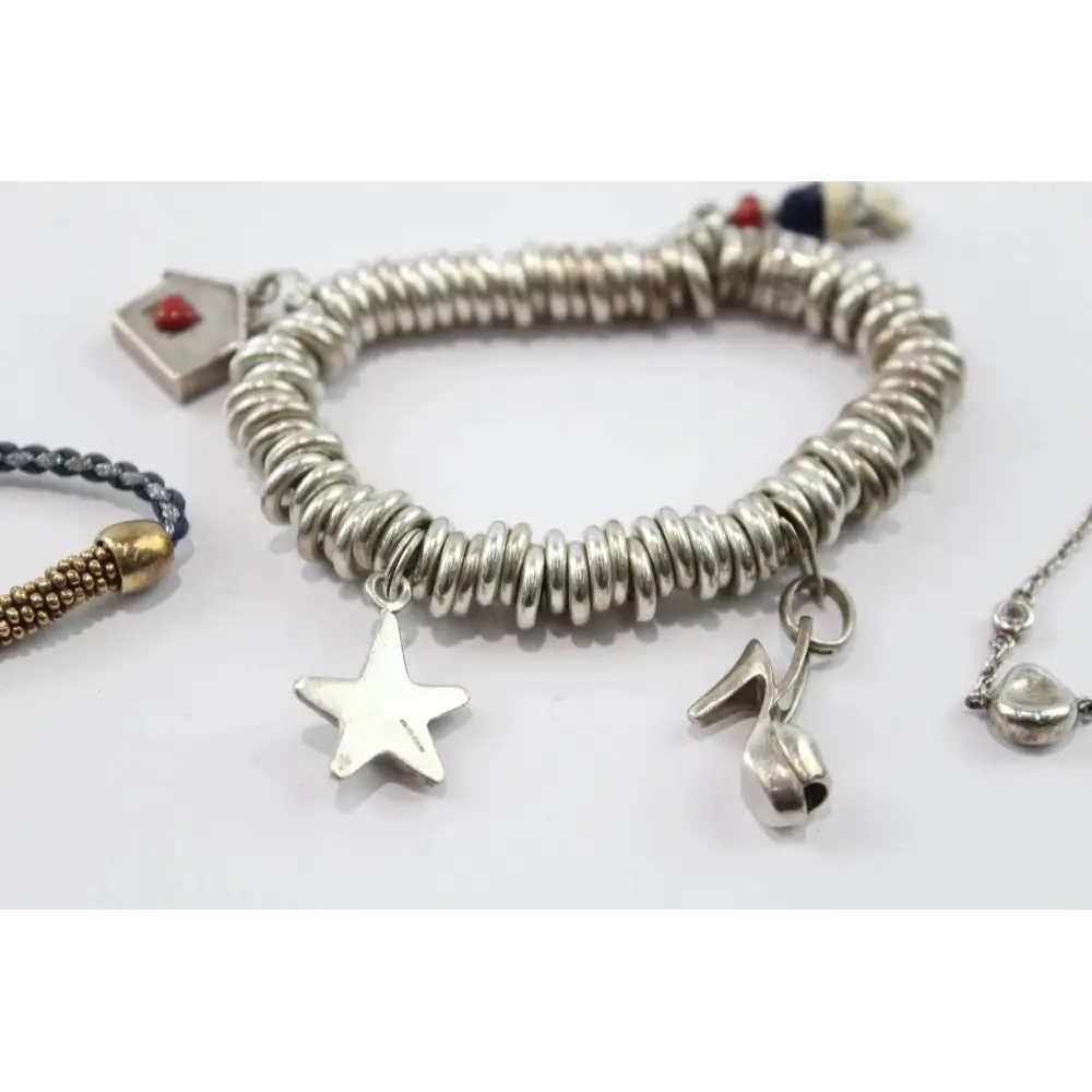 Silver bracelet with charms
