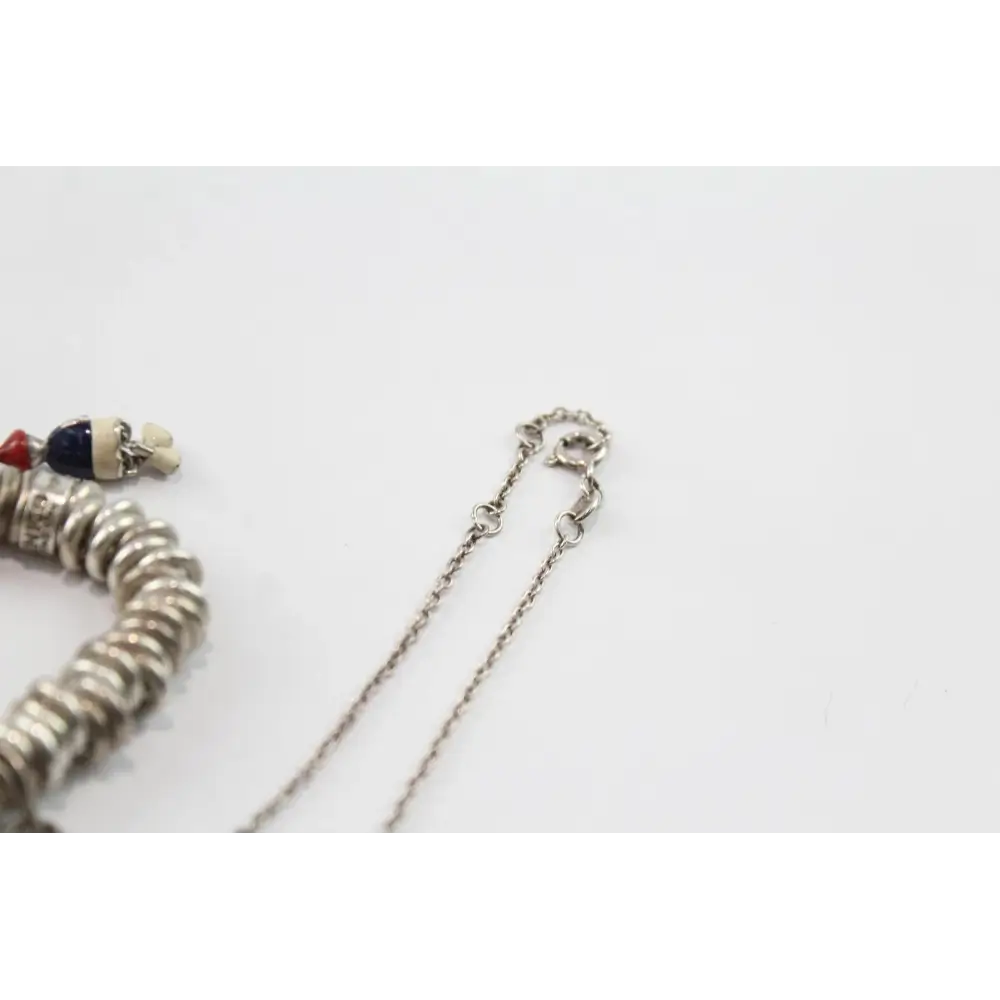 Close-up of a silver bracelet with a chain
