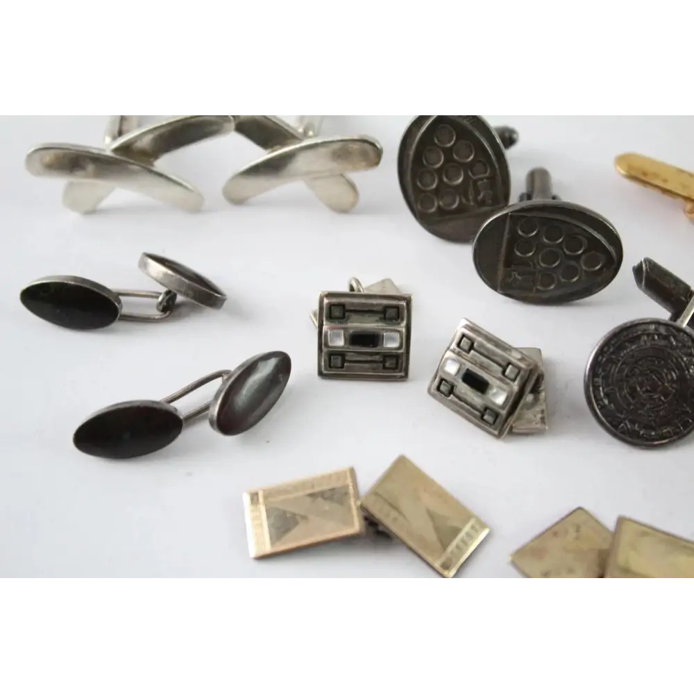 Collection of various metal cufflinks