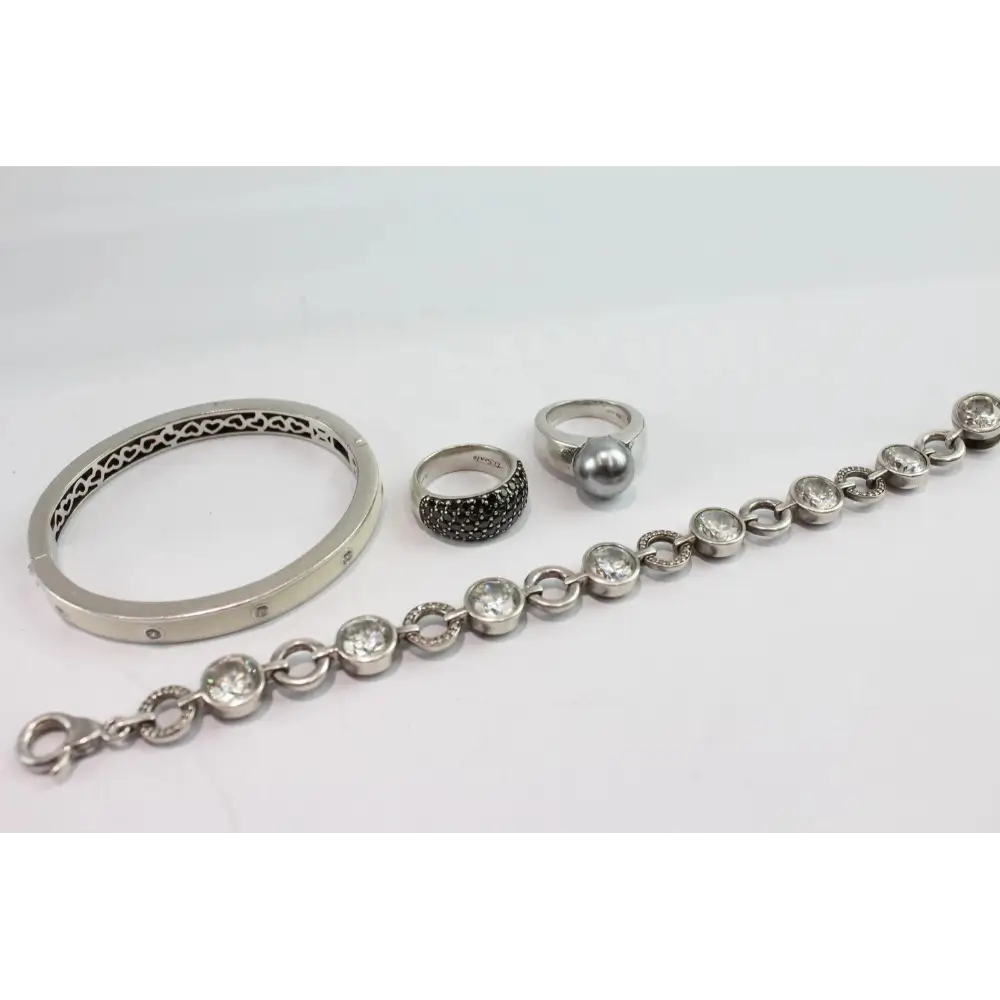 Silver bracelet and rings
